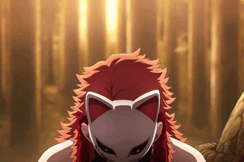 a person with red hair is wearing a white fox mask
