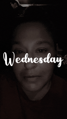 a black and white photo of a woman with the words wednesday written above her face