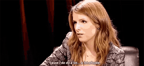 a woman is sitting in a chair and saying `` cause i do do a lot a lot of coke . ''