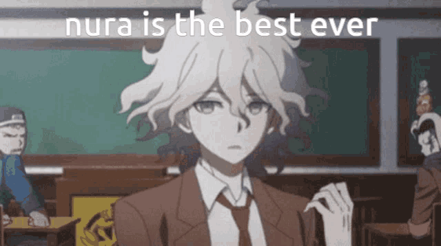 a man in a suit and tie is standing in a classroom with the words " nura is the best ever " above him
