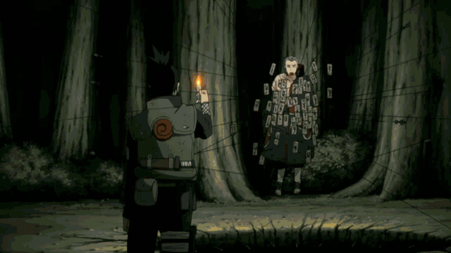 a man is standing in front of a large explosion in a forest
