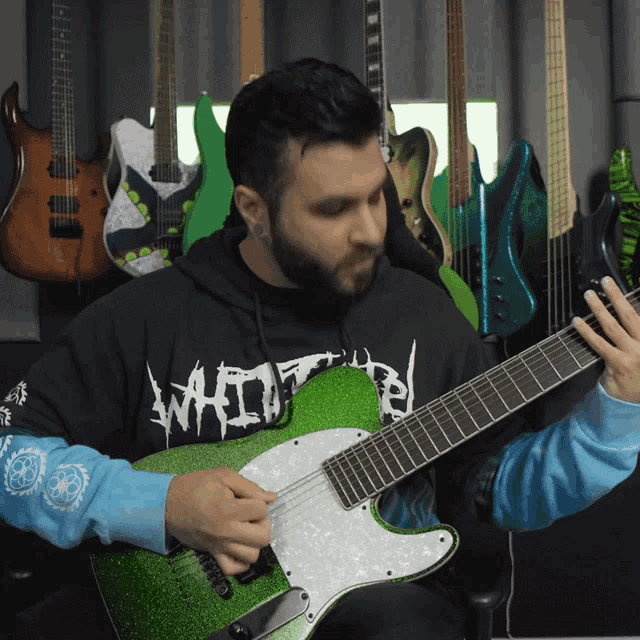 Playing Guitar Andrew Baena GIF - Playing Guitar Andrew Baena Plucking GIFs