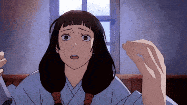 a girl in a blue kimono is standing in front of a window and looking at the camera .