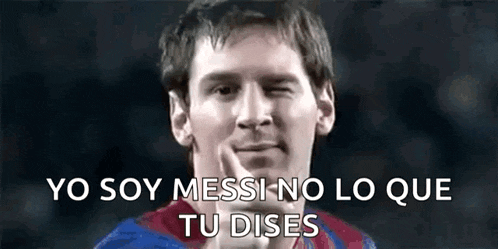 a close up of a soccer player making a funny face with his finger in his mouth .
