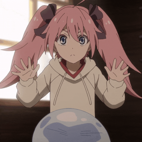 a girl with pink hair and blue eyes is standing next to a blue sphere