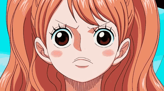a close up of a girl 's face with orange hair