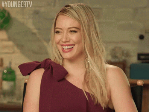 Happy Laugh GIF - Hilary Duff Kelsey Peters Lol GIFs