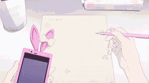 a person is writing on a piece of paper while holding a pink phone .