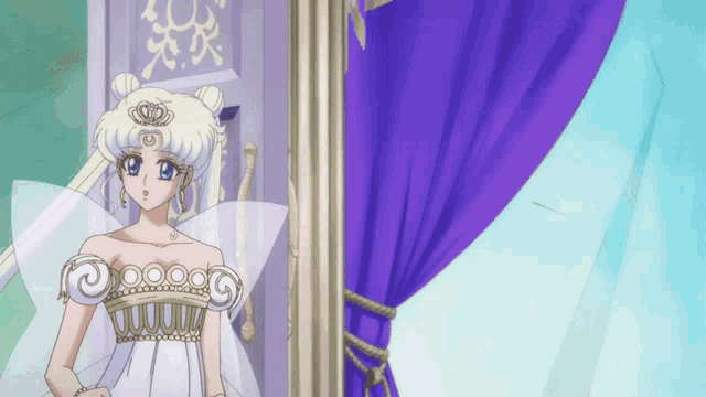 a woman in a white dress with a crown on her head stands in front of a purple curtain