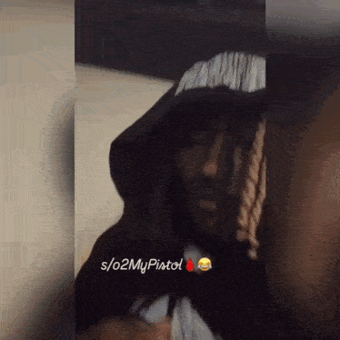 a man wearing a hoodie and a hat has the hashtag s / 02mypisto on the bottom