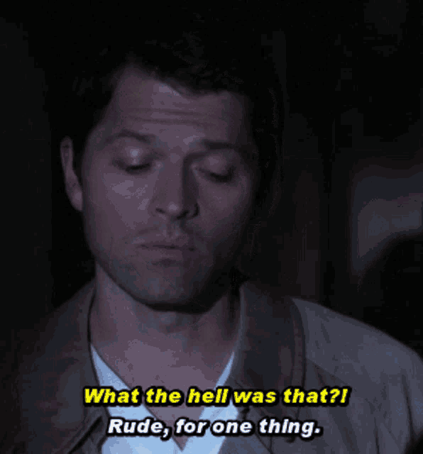 a man says " what the hell was that " in a dark room