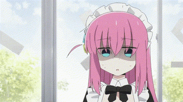 a girl with pink hair is wearing a maid costume