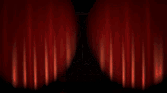 a sign for rocko 's fish room is behind a red curtains