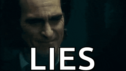 a close up of a man 's face with the words lies written above him .