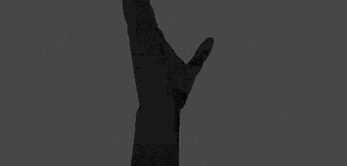 a black and white drawing of a person 's hand holding another person 's hand .