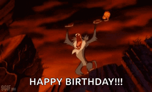 a monkey from the lion king is holding a stick in his mouth and shouting happy birthday .