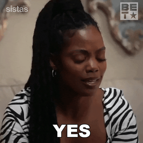 a woman in a striped shirt says yes