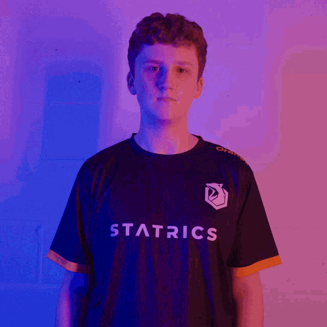 a young man wearing a shirt that says statistics