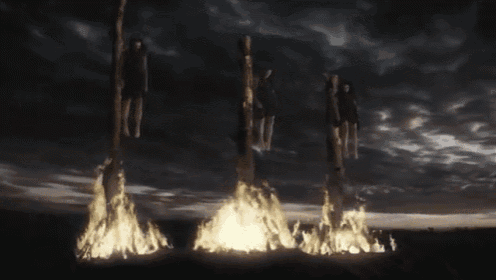 a group of people hanging over a fire