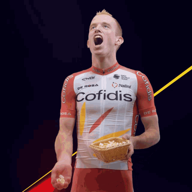 a man wearing a red and white jersey that says cofidis