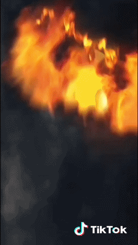 a picture of a fire with tiktok written in the corner