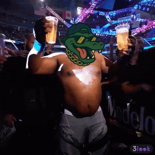 a man in ufc shorts is holding a beer in his hand