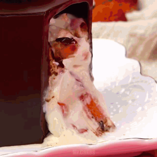 a close up of a piece of cake that says mr. cakes on it