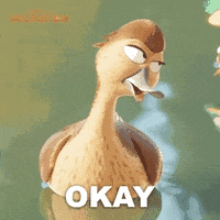 a cartoon duck says " okay " with its tongue out