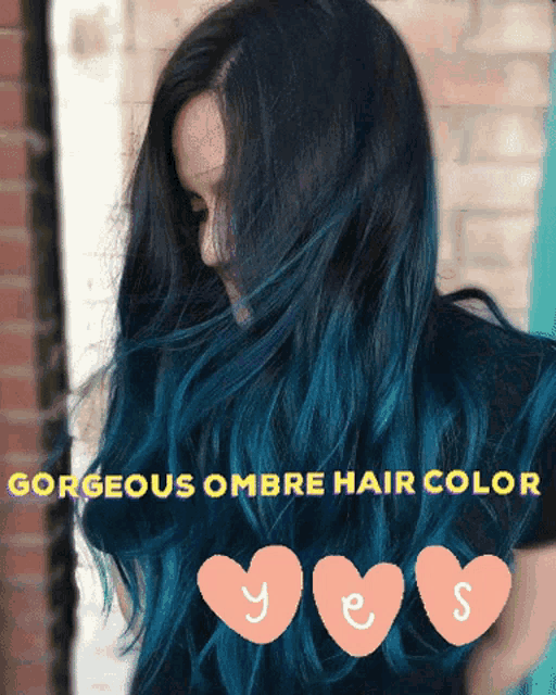 a woman with long black hair with blue highlights and the words gorgeous ombre hair color