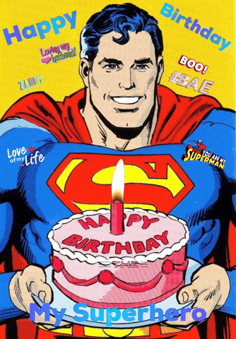 a superman holding a birthday cake with a candle and the words happy birthday my superhero