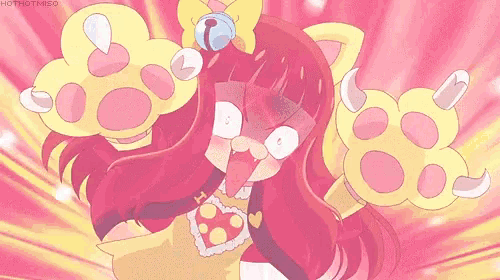 a pink and yellow anime girl with cat paws and a bell on her head .