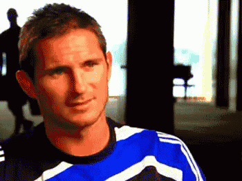 a man wearing a blue and white adidas shirt
