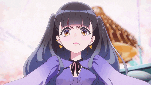 a girl in a purple dress with a bow around her neck