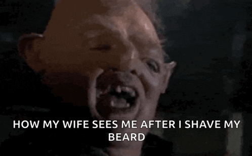 a man with a beard is laughing and says `` how my wife sees me after i shave my beard ''