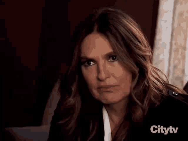 a close up of a woman 's face with the citytv logo visible