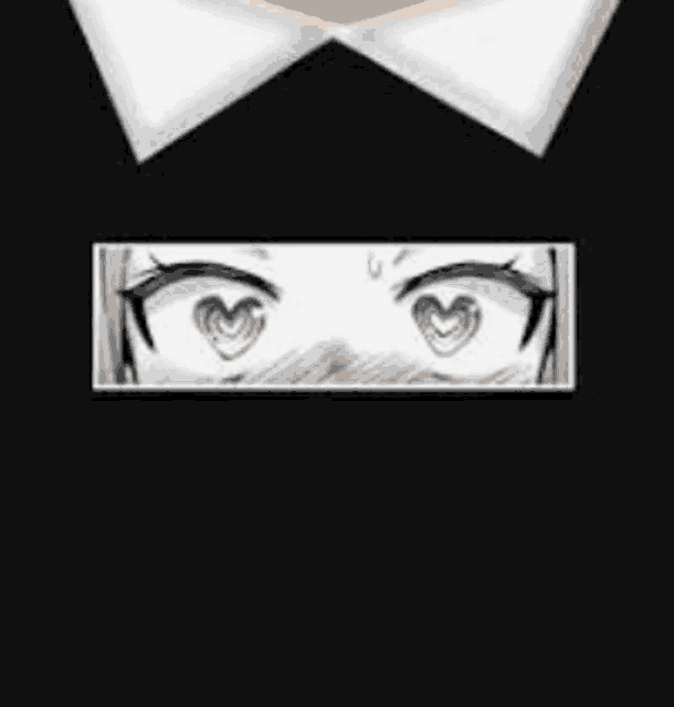 a black shirt with a bow tie and a picture of a girl 's eyes with a heart shaped pupil .