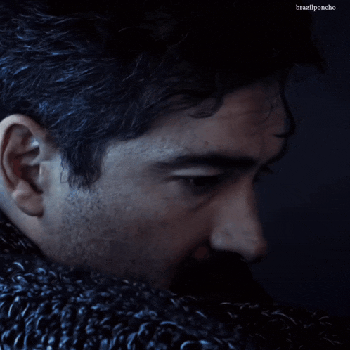 a close up of a man 's face with the words brazilponcho above him