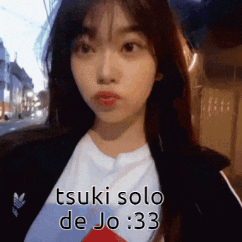 a woman wearing a white shirt and a black jacket says tsuki solo de jo 33
