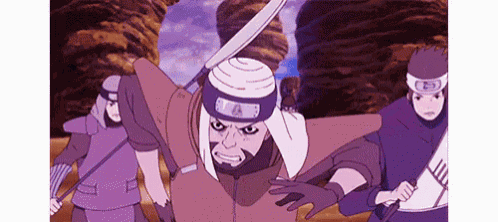 a group of people are standing next to each other holding swords and a sword .