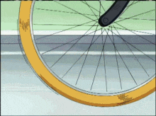 a close up of a bicycle wheel with a yellow tire that says ' schwalbe ' on it