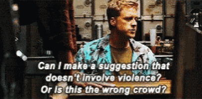 a man is holding a sign that says " can i make a suggestion "