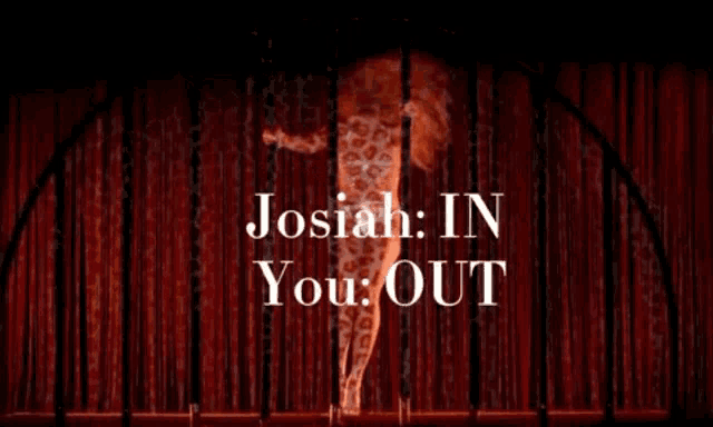 a giraffe is on a pole in front of a red curtain that says " josiah in you out "