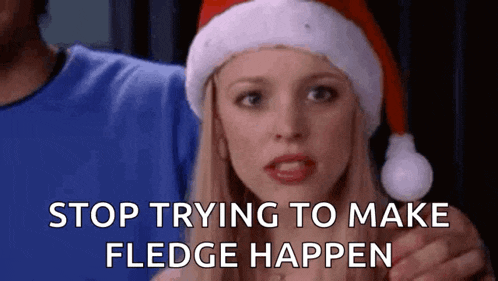 a woman wearing a santa hat is holding a man 's hand and says `` stop trying to make fledge happen '' .