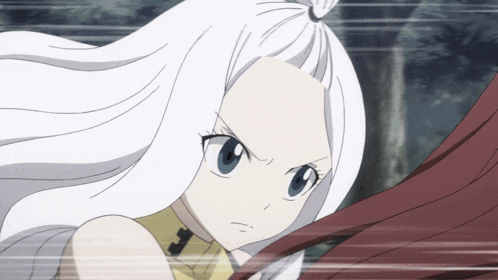 a girl with white hair and blue eyes is looking at the camera