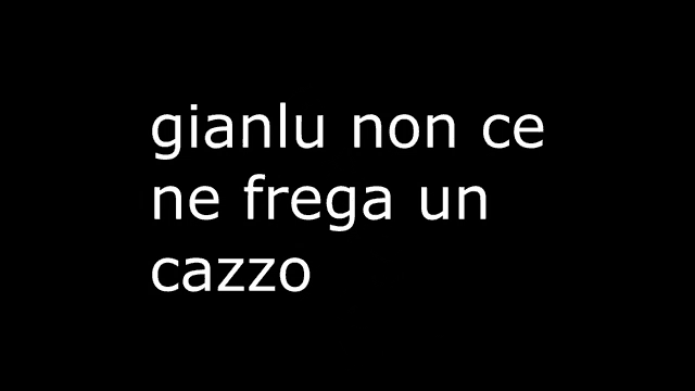 a black background with white text that says cazzo