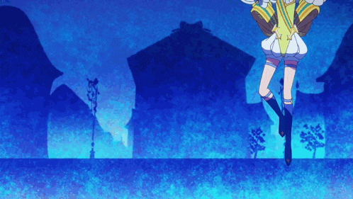 a girl is jumping in the air in front of a building