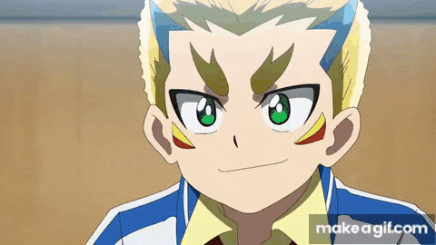 a close up of a boy 's face from a cartoon with a blue shirt and a yellow shirt .