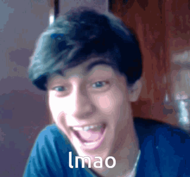 a blurry picture of a young man with the word imao written below him