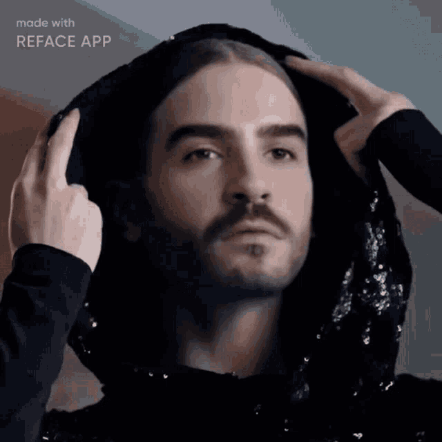 a man with long hair and a beard is wearing a black sequined hoodie made with the reface app