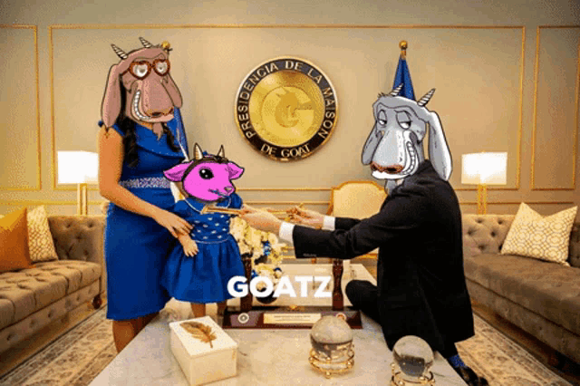 a picture of a man and woman with goats on their heads and the word goatz on the bottom
